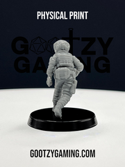 a small plastic toy of a man in a space suit