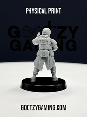 a toy figurine of a man with a gun
