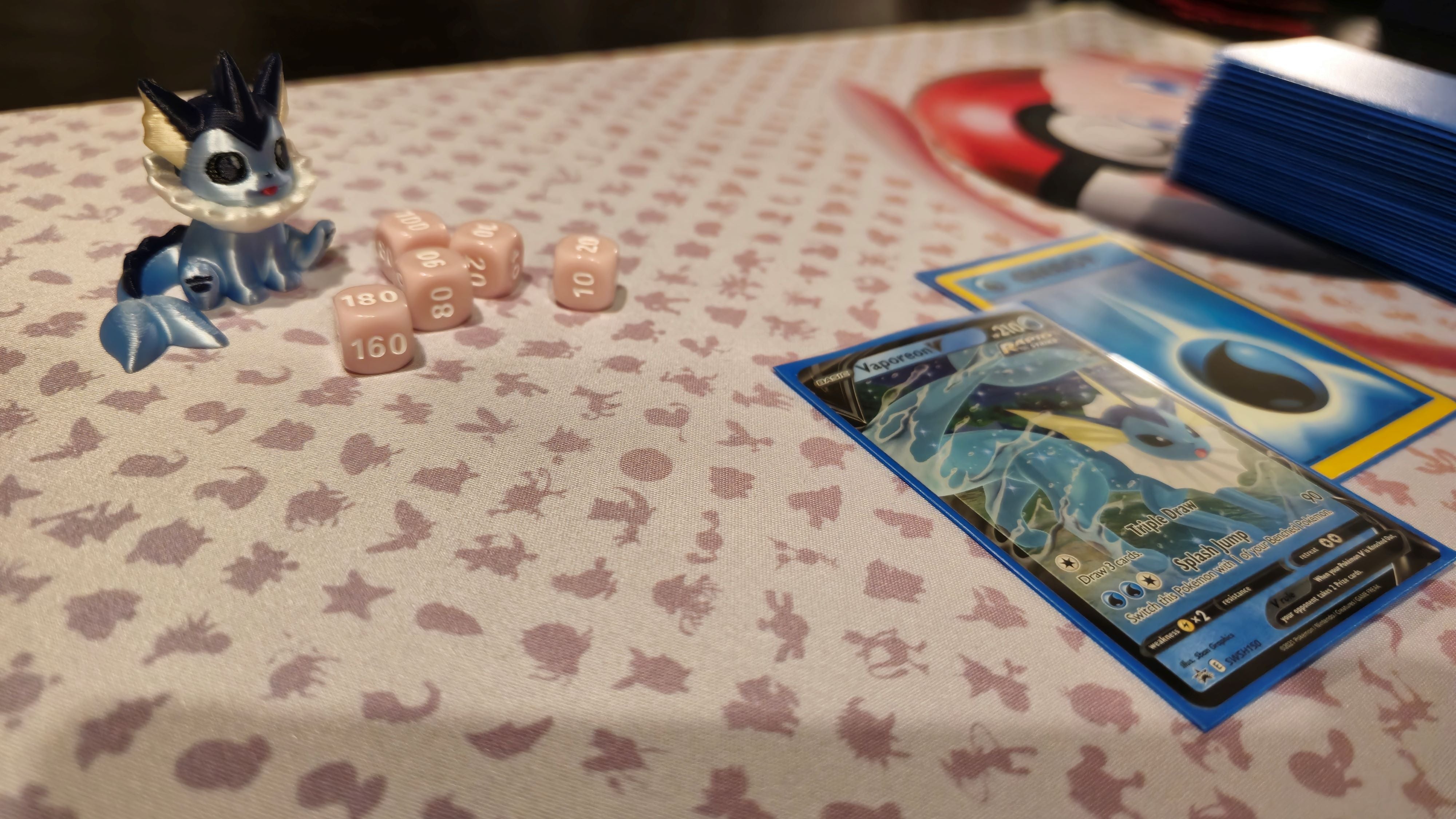 a close up of a table with dices and a game